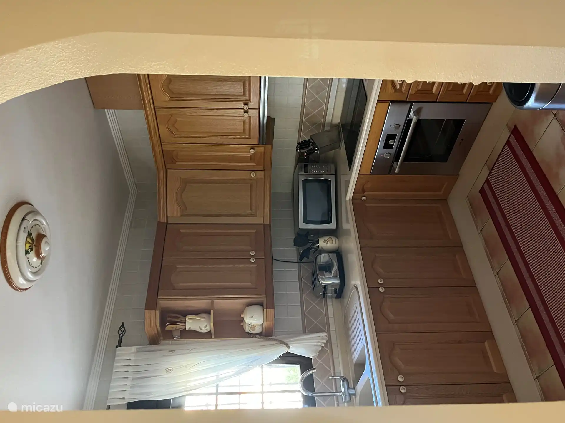 The kitchen is fully equipped. A large fridge-freezer combination, induction hob, Nesspresso machine, toaster, kettle and lots of kitchen utensils.