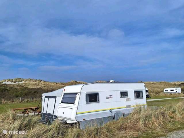 Holiday home in Netherlands, Ameland – mobile home Caravan with awning by the sea Ameland