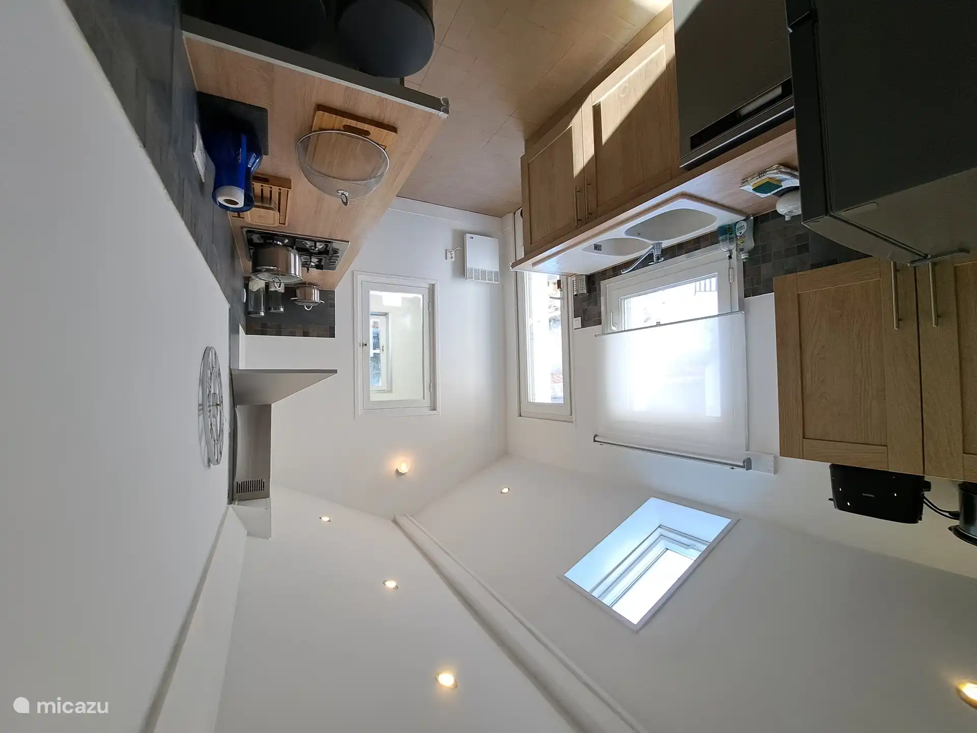 Kitchen with attached laundry room