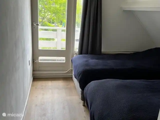 casa de vacaciones Lytse Mar en Países Bajos, Frise, Idskenhuizen - casa vacacional 2º dormitorio al lado del agua. Dos camas separadas que también se pueden juntar.