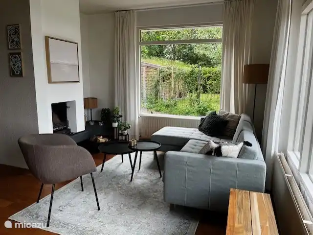 casa de vacaciones Lytse Mar en Países Bajos, Frise, Idskenhuizen - casa vacacional Acogedora sala de estar con chimenea