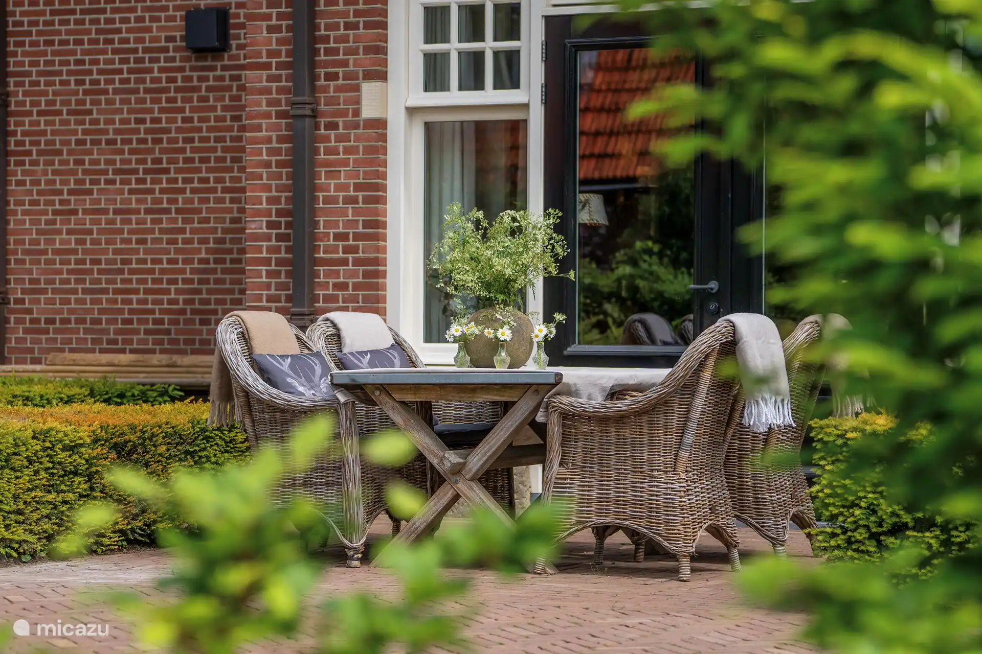 Maison de vacances Landelijk Twente terrasse avec sièges