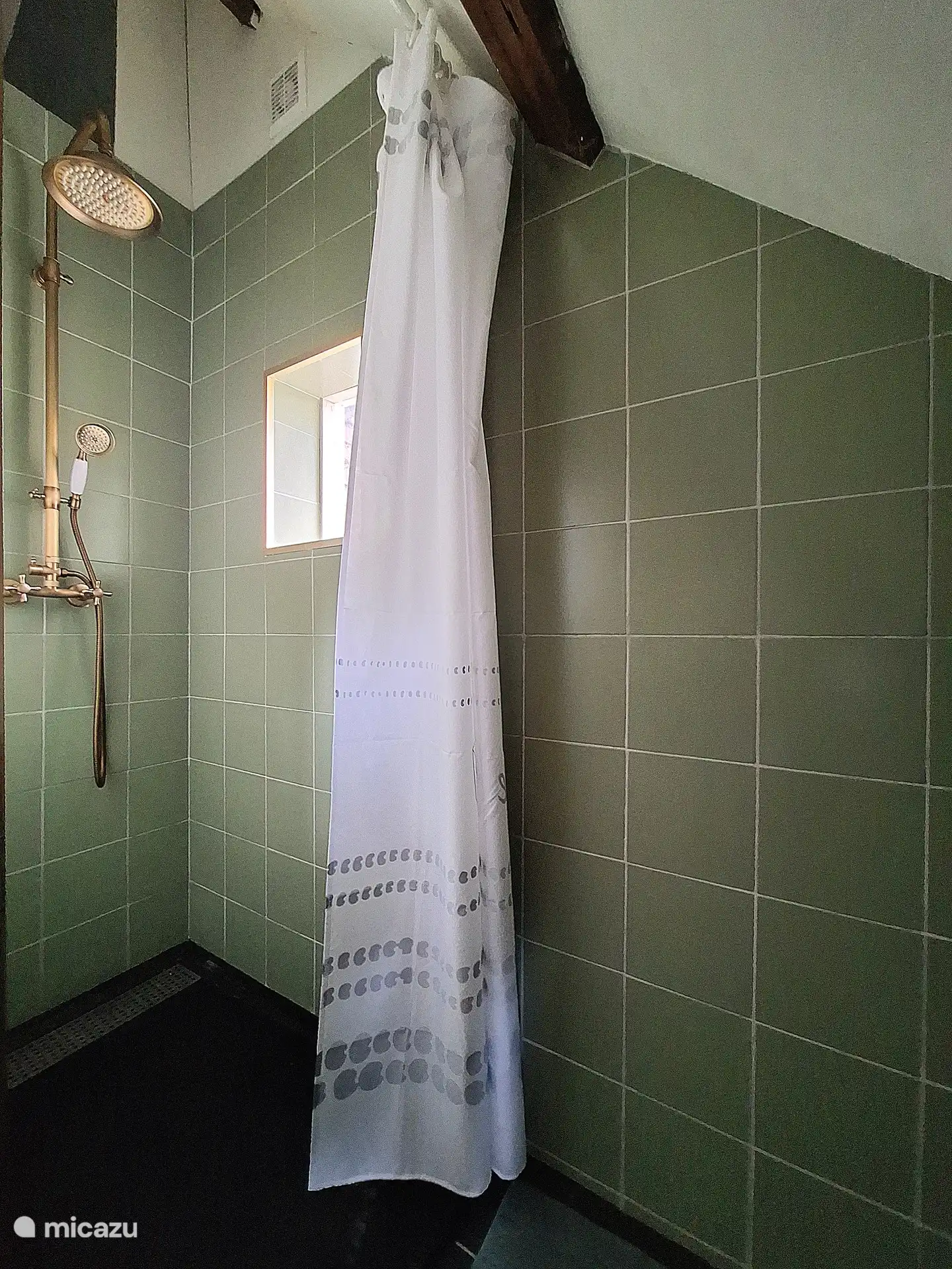 A nice hot shower with a very nice jet of water. This shower is located in the second bedroom