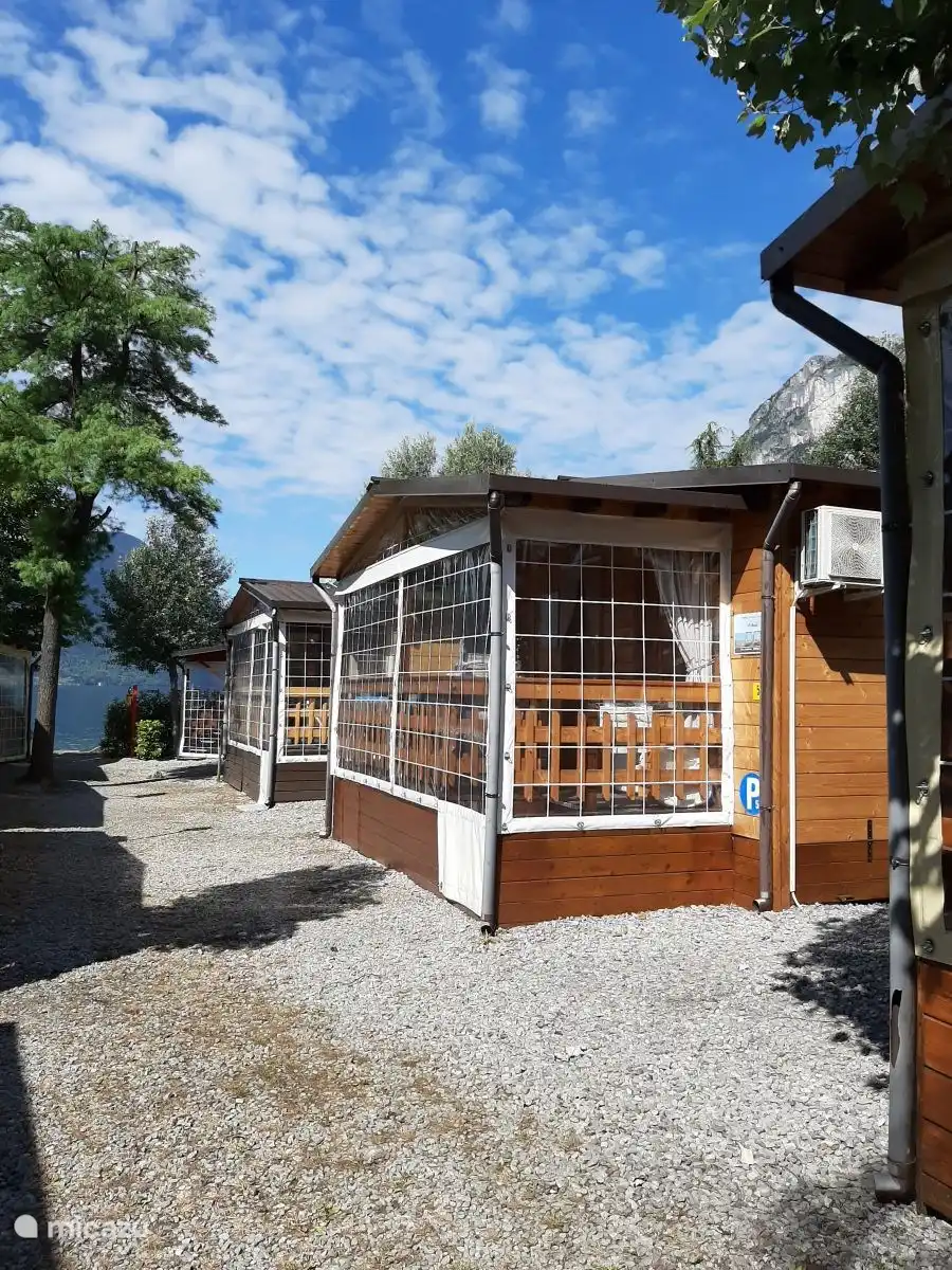 The veranda can be closed off so that you can also sit &#39;outside&#39; in bad weather