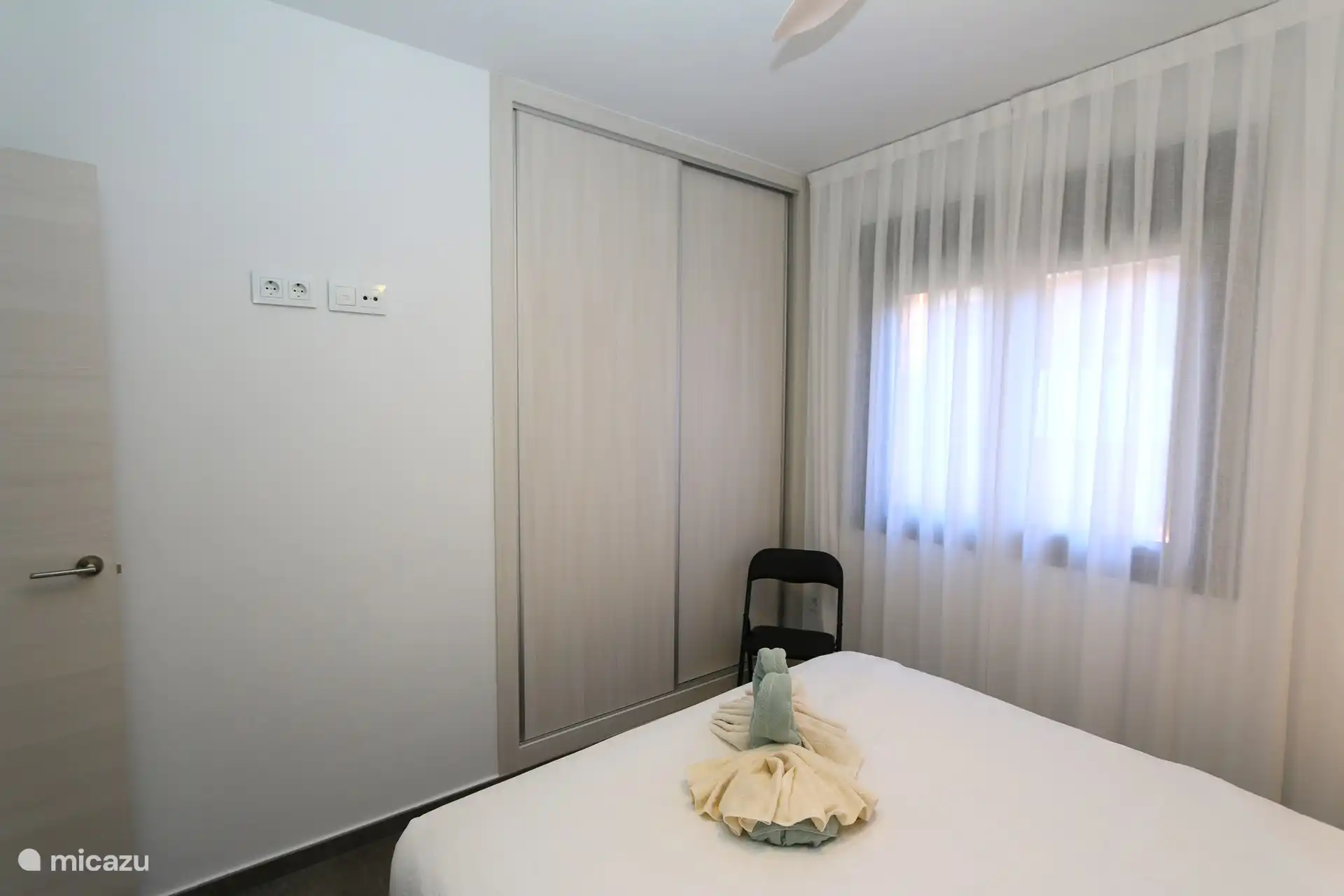 The built-in wardrobe in the bedroom.