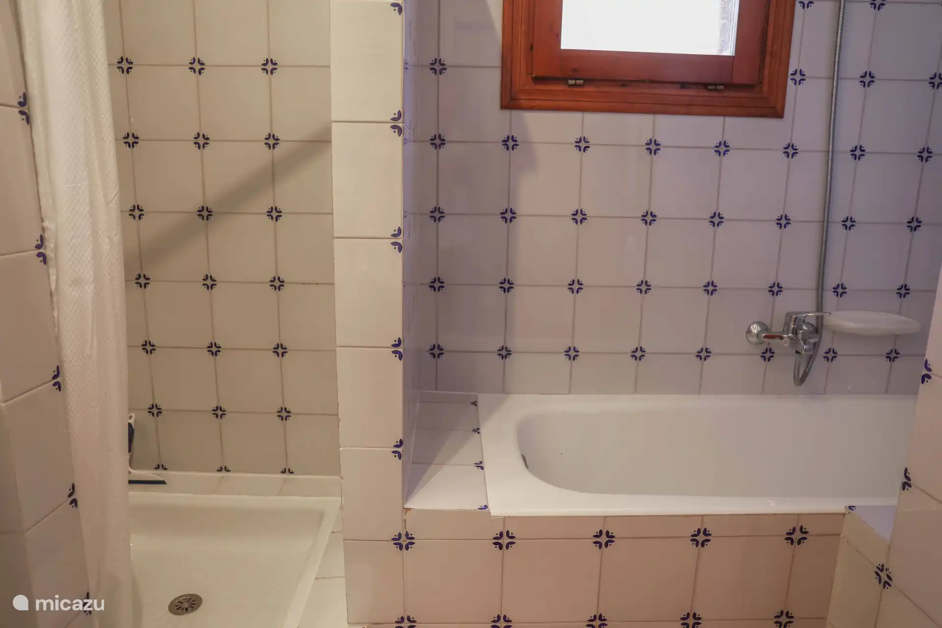 Bathroom with bath and shower