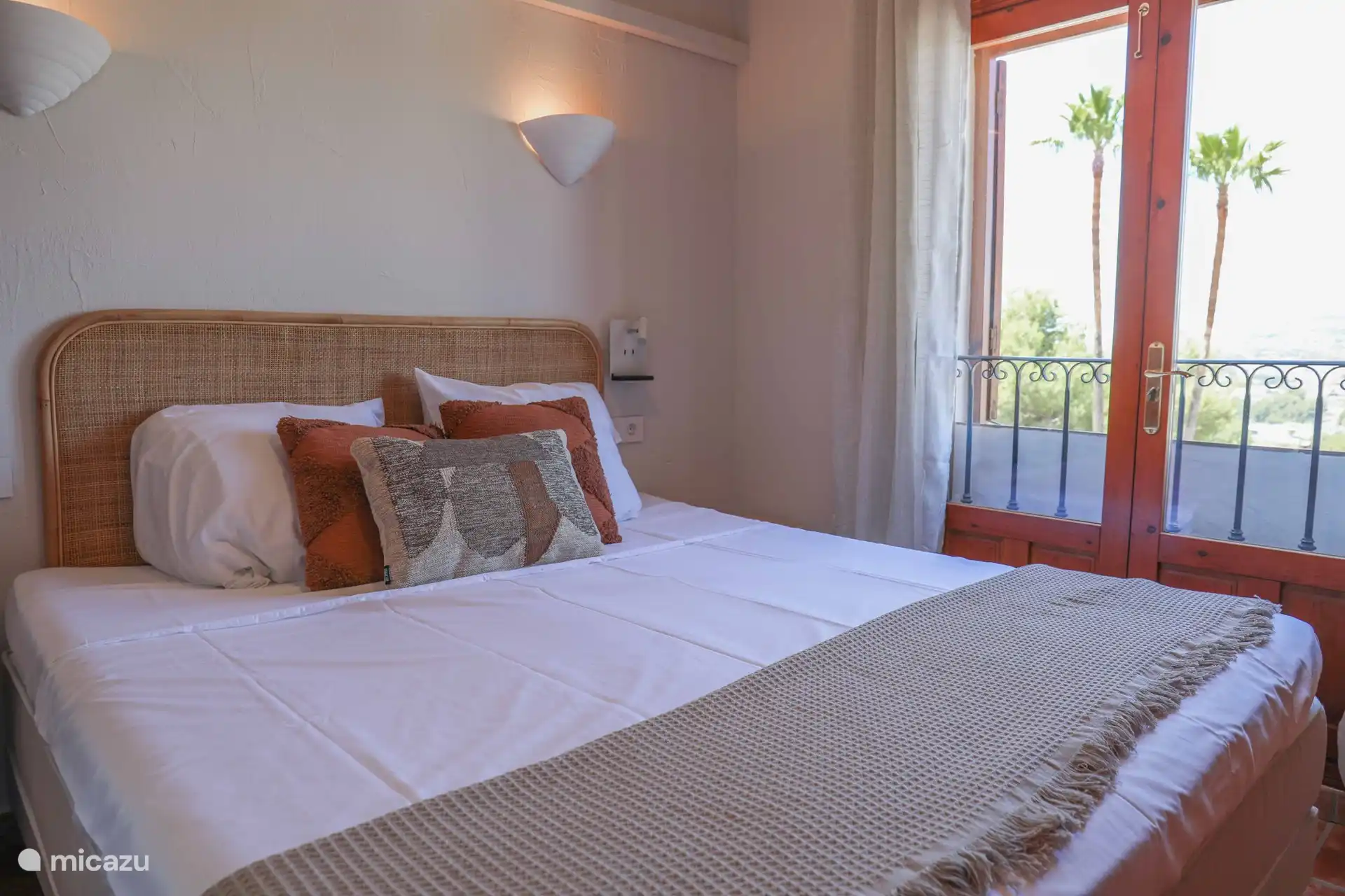 Bedroom with double bed on the upper floor