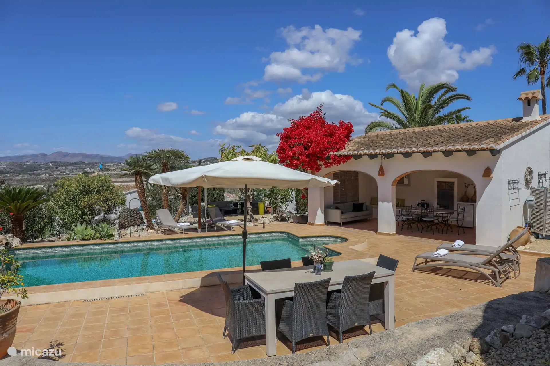 Dining table with parasol, beautiful view
