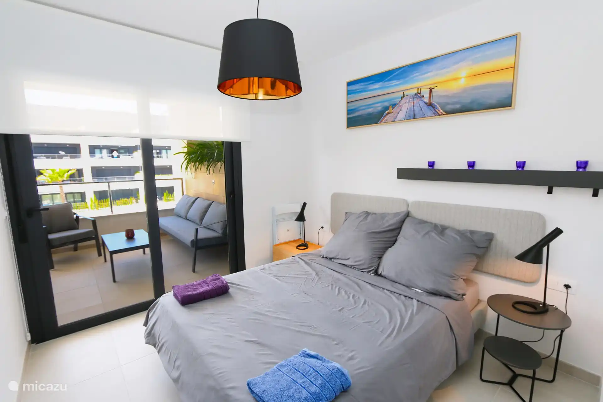 Chambre avec lit double attenante au balcon