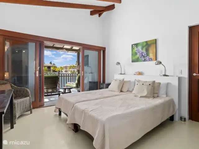 Pueblo de las Tierras Acuáticas, Casa Cascaya en Bonaire, Bonaire, Kralendijk - casa vacacional Dormitorio uno