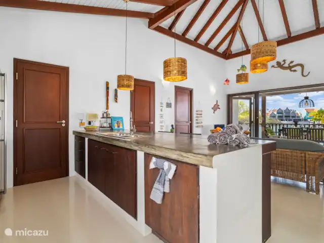 Pueblo de las Tierras Acuáticas, Casa Cascaya en Bonaire, Bonaire, Kralendijk - casa vacacional Cocina y salón