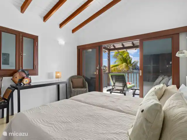 Pueblo de las Tierras Acuáticas, Casa Cascaya en Bonaire, Bonaire, Kralendijk - casa vacacional Dormitorio uno