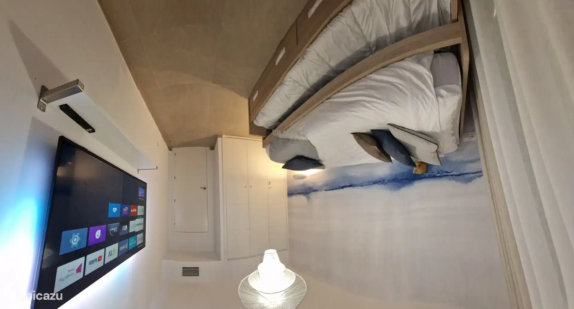 Dormitorio con cama individual y cama nido