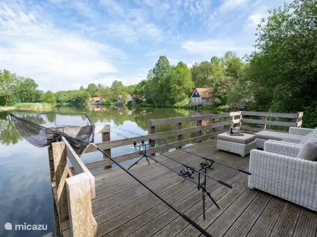 Casa de campo para pescar y montar en bicicleta 5* en Países Bajos, Drente, Westerbork - casa vacacional Vista del lago desde la terraza