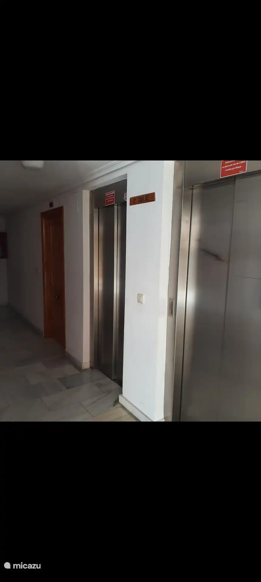 Front door apartment on the ground floor next to the elevator for access to parking garage