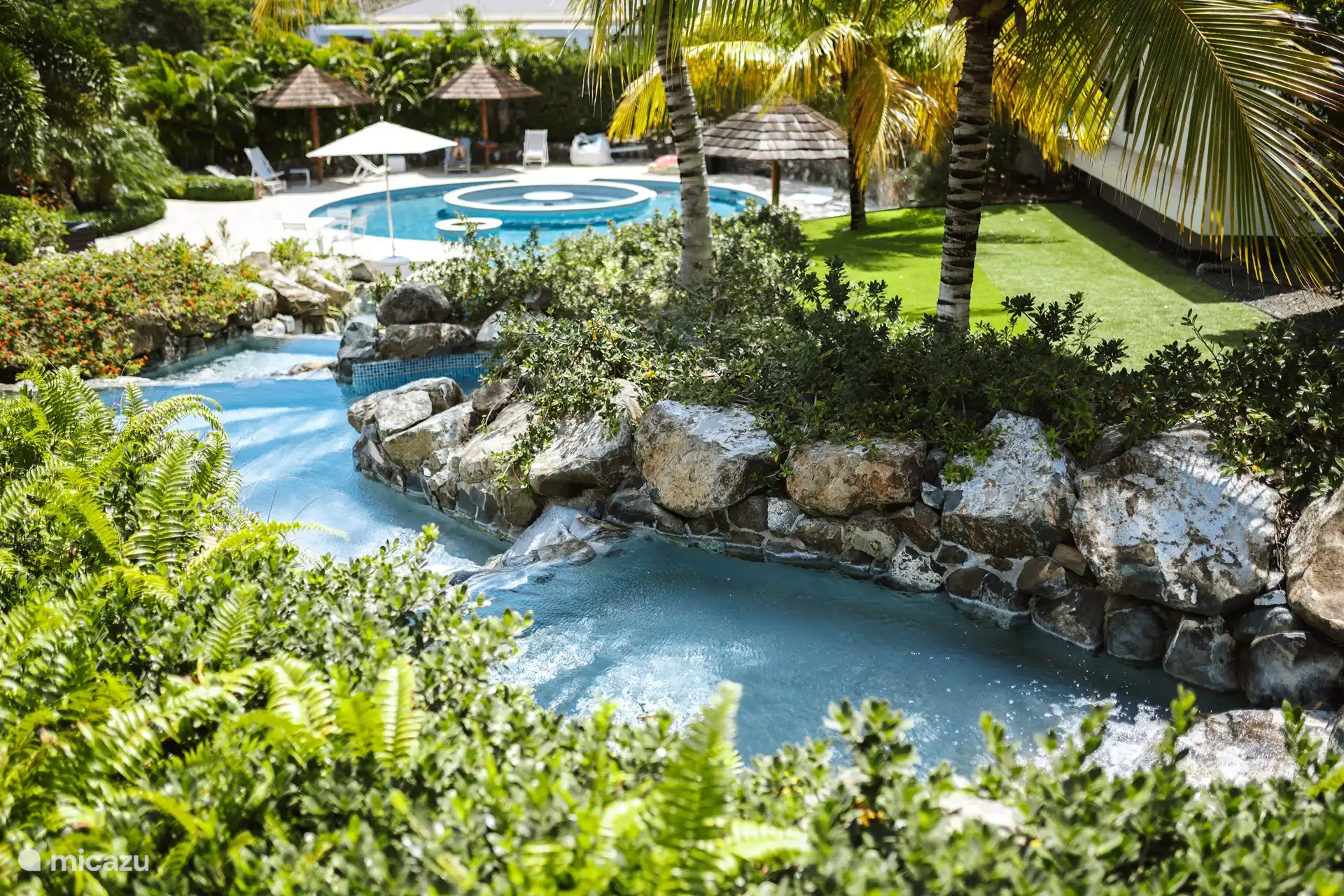 The waterfalls that end in the pool.