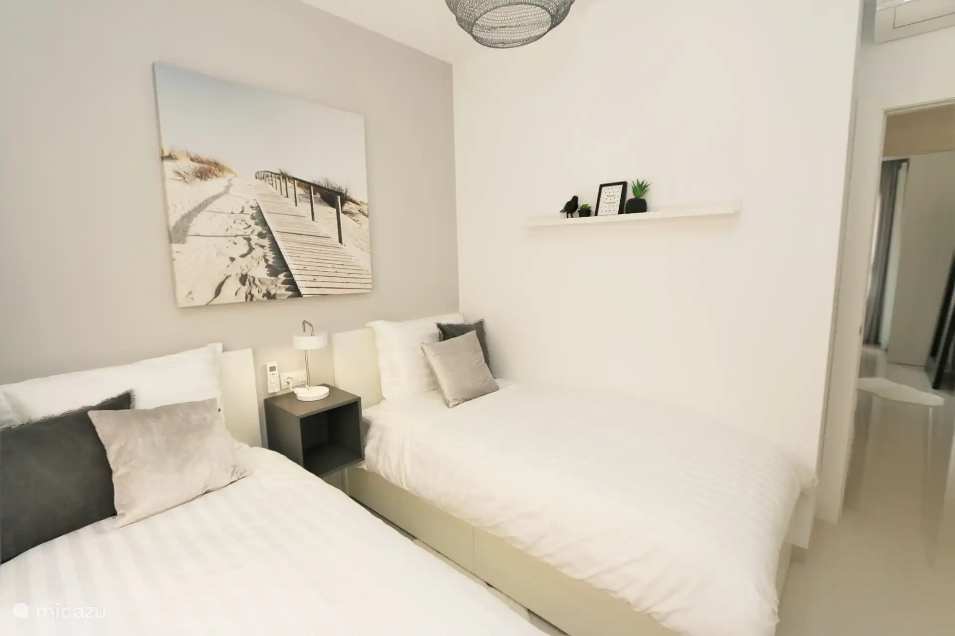 Schlafzimmer mit zwei Einzelbetten