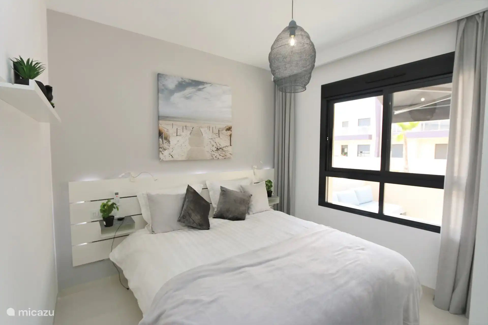 Schlafzimmer mit Doppelbett