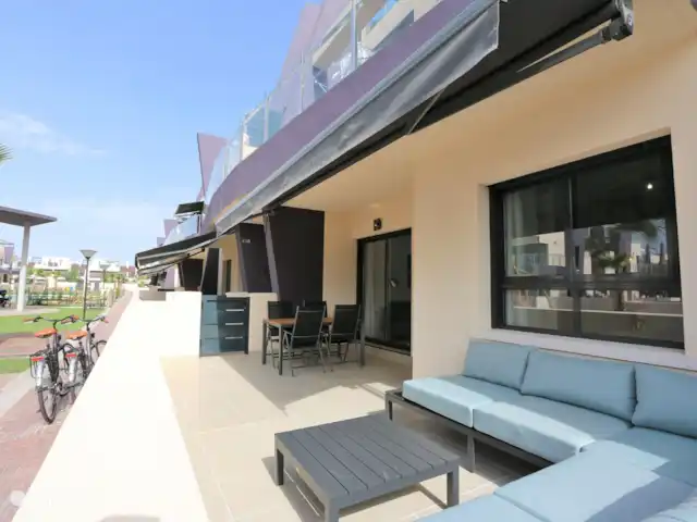 Bel appartement proche de la plage | Espagne, Costa Blanca, Torre de la Horadada - appartement Jardin avant avec salon