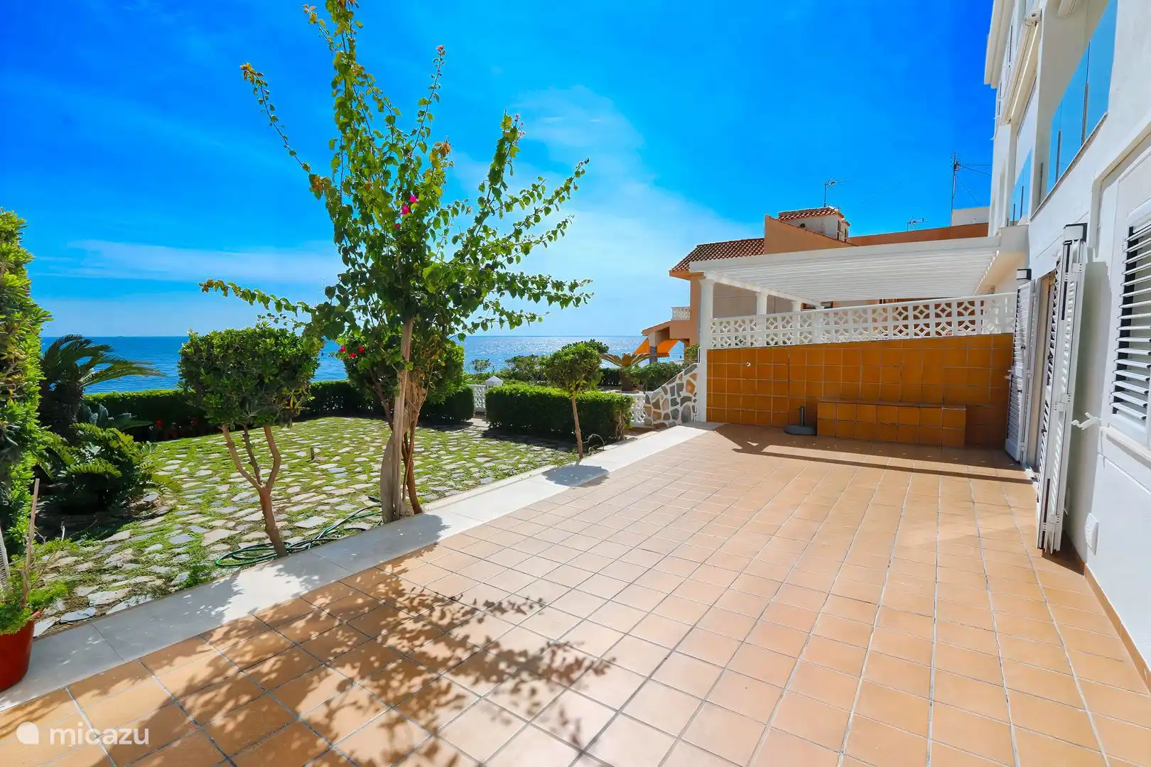 Beach house right by the sea