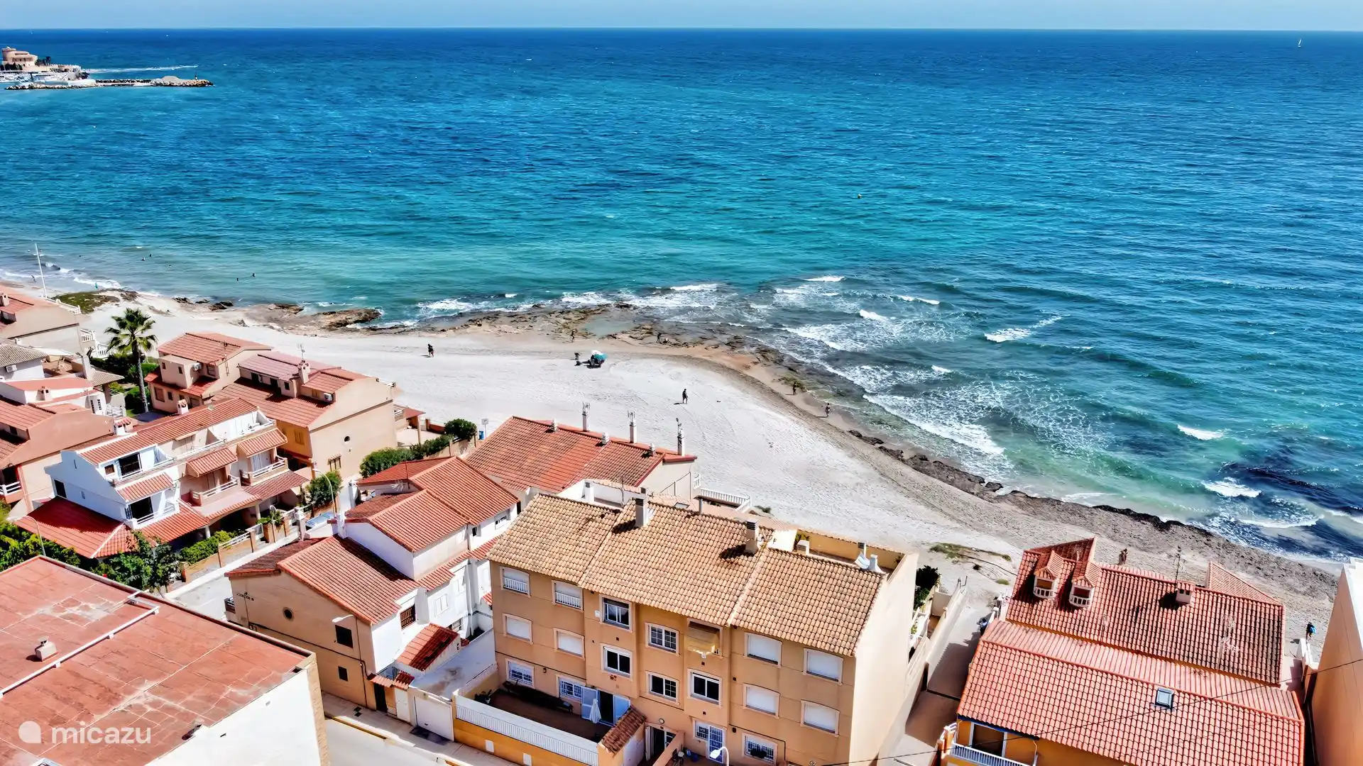 Beach house right by the sea