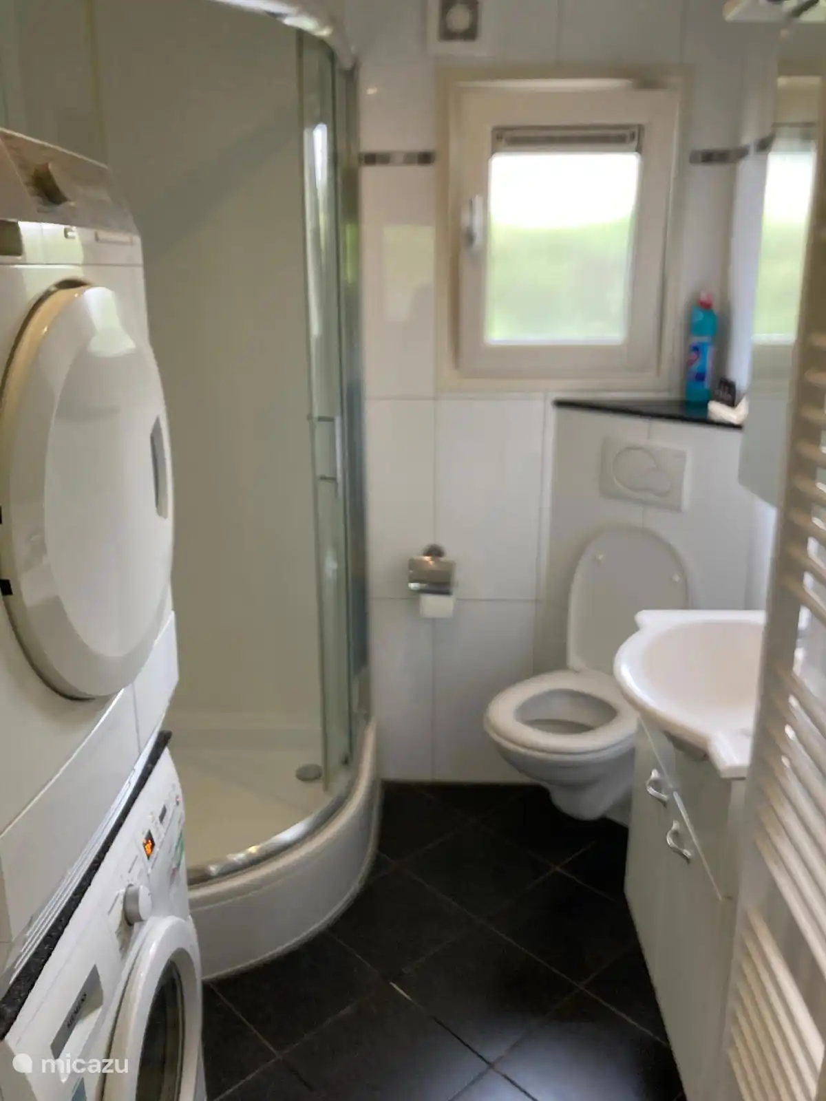 nice bathroom with washer and dryer