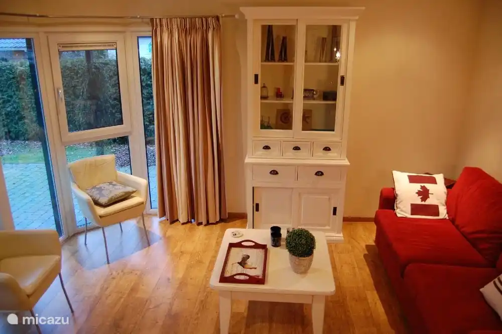 a cozy living room all curtains can be closed 