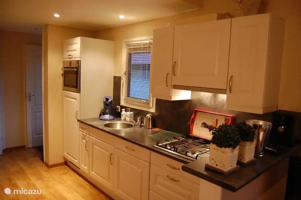 The kitchen is fully equipped: a dishwasher, air fryer, combi microwave, Senseo, coffee maker.  etc 