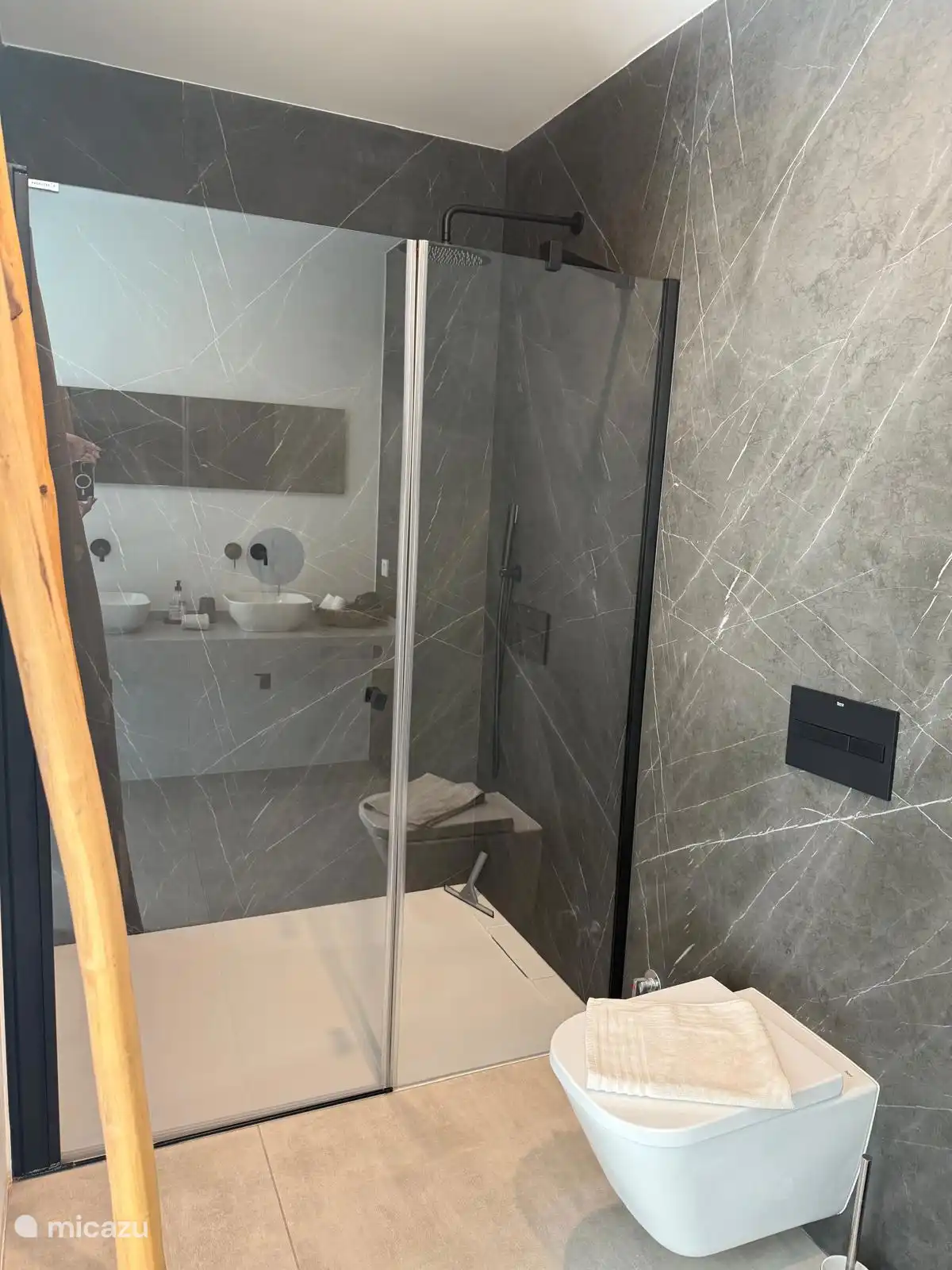the shower in the bathroom of the master bedroom