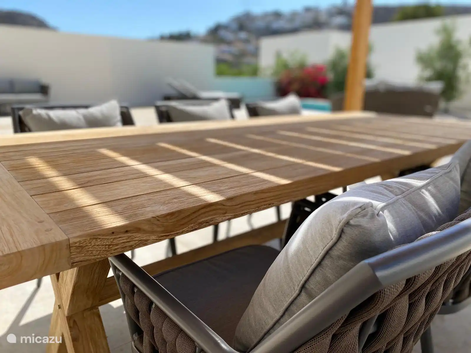 the covered terrace with dining area