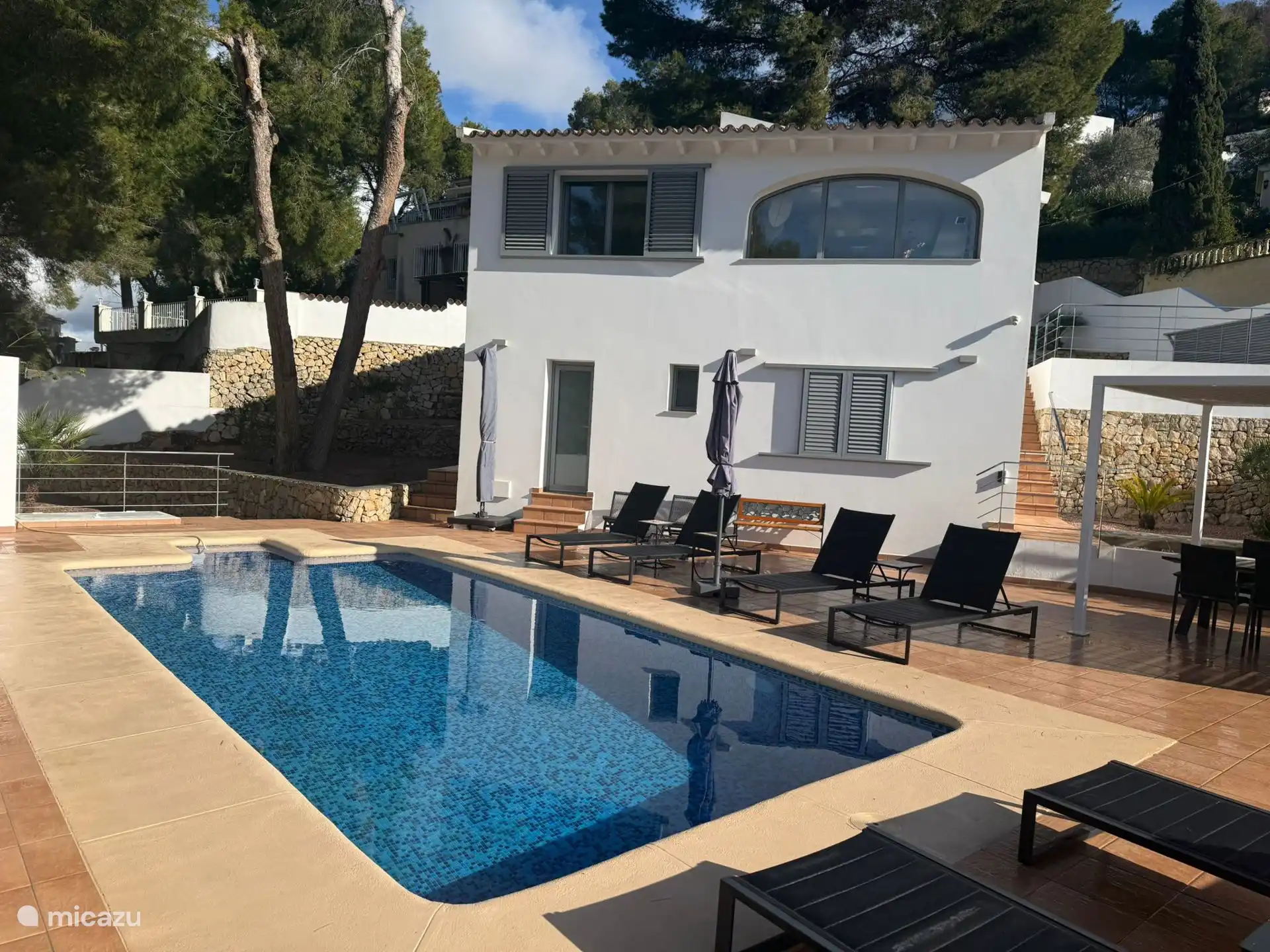 The villa has a large heated swimming pool