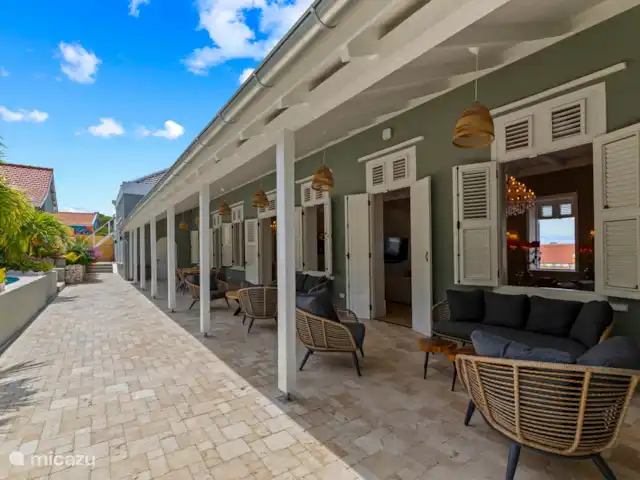 Maison de campagne Kranshi, centre Willemstad | Curaçao, Curaçao-Centre, Willemstad - manoir / château Coin salon : Un endroit idéal pour se détendre et profiter