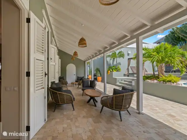 Maison de campagne Kranshi, centre Willemstad | Curaçao, Curaçao-Centre, Willemstad - manoir / château Coin salon : Un endroit idéal pour se détendre et profiter