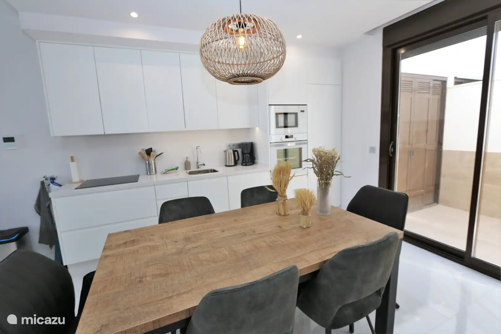 Dining table and kitchen