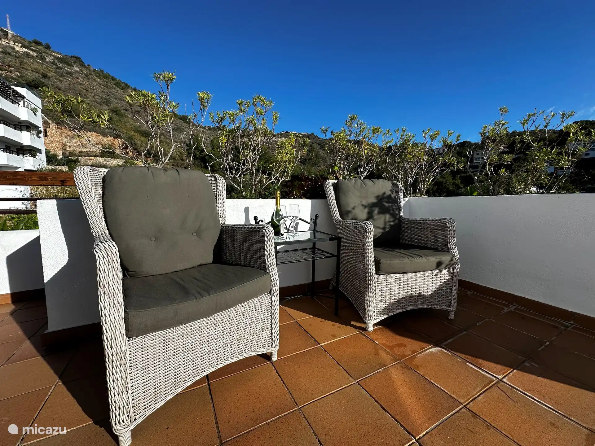 On yet another part of the terrace: enjoy the sun and the view.