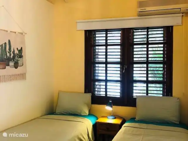 villa huren in Curaçao, Curacao-Midden, Sint Michiel – Blue Bay Village: Villa Bon Bista Slaapkamer 3 met twee enkele bedden
