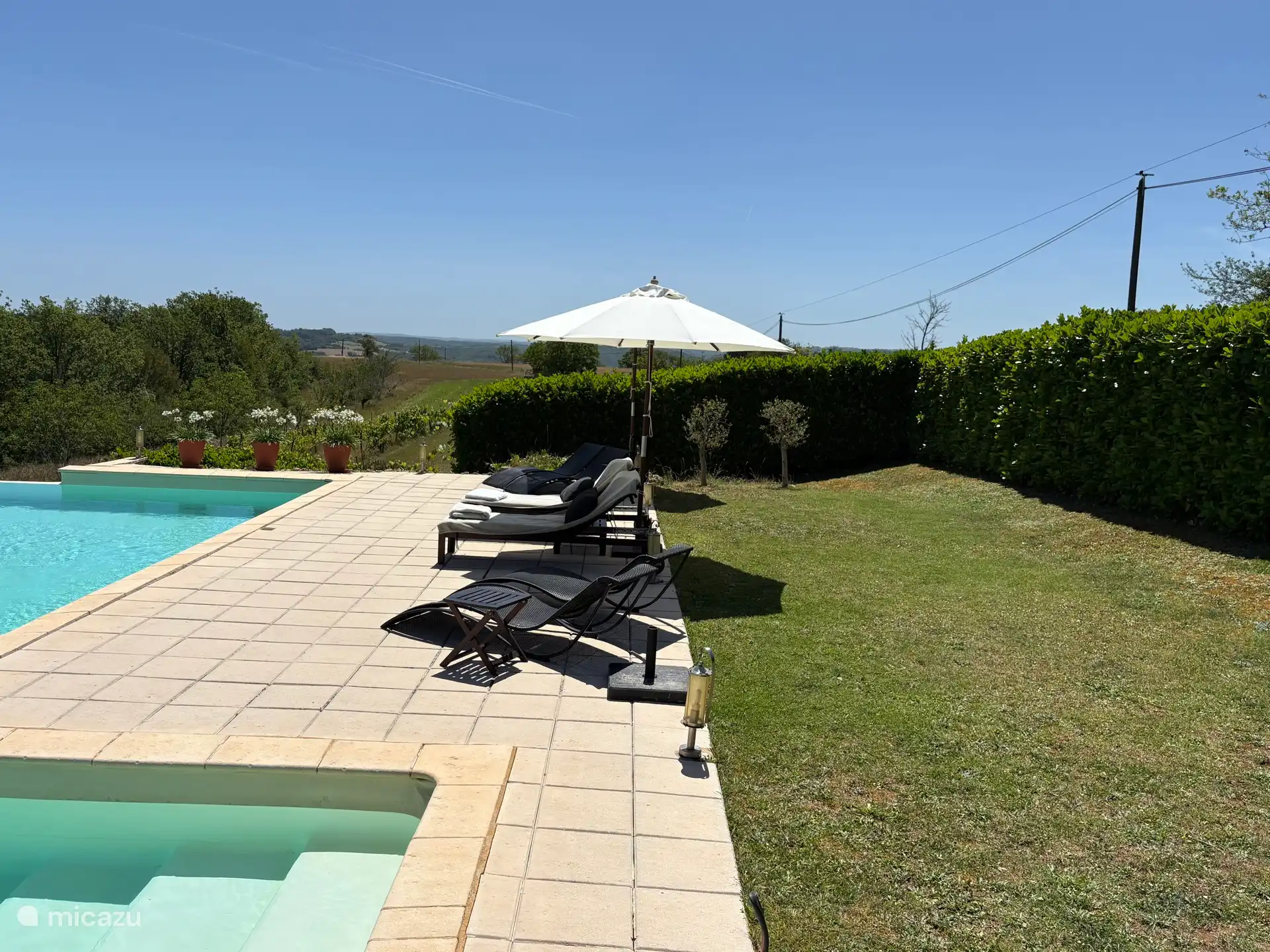 Relax by the pool with a view of the wine landscape