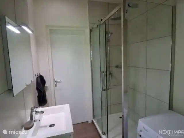 The Ultimate Caribbean Experience | Curaçao, Curaçao-Centre, Sint Michiel - appartement Salle de bain avec set de serviettes et machine à laver