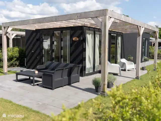 Kukeluusje Ermelo | Pays-Bas, Gueldre, Ermelo - maison de vacances Vue latérale du chalet avec ensemble de salon