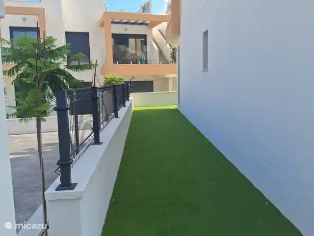 Casa del Sol Villamartin huren in Spanje, Costa Blanca, Villamartin - appartement Zijkant huis met tuin