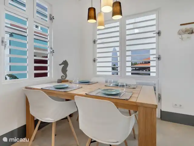 Waterdream apartment Watervillas huren in Bonaire, Bonaire, Kralendijk - appartement eettafel binnen