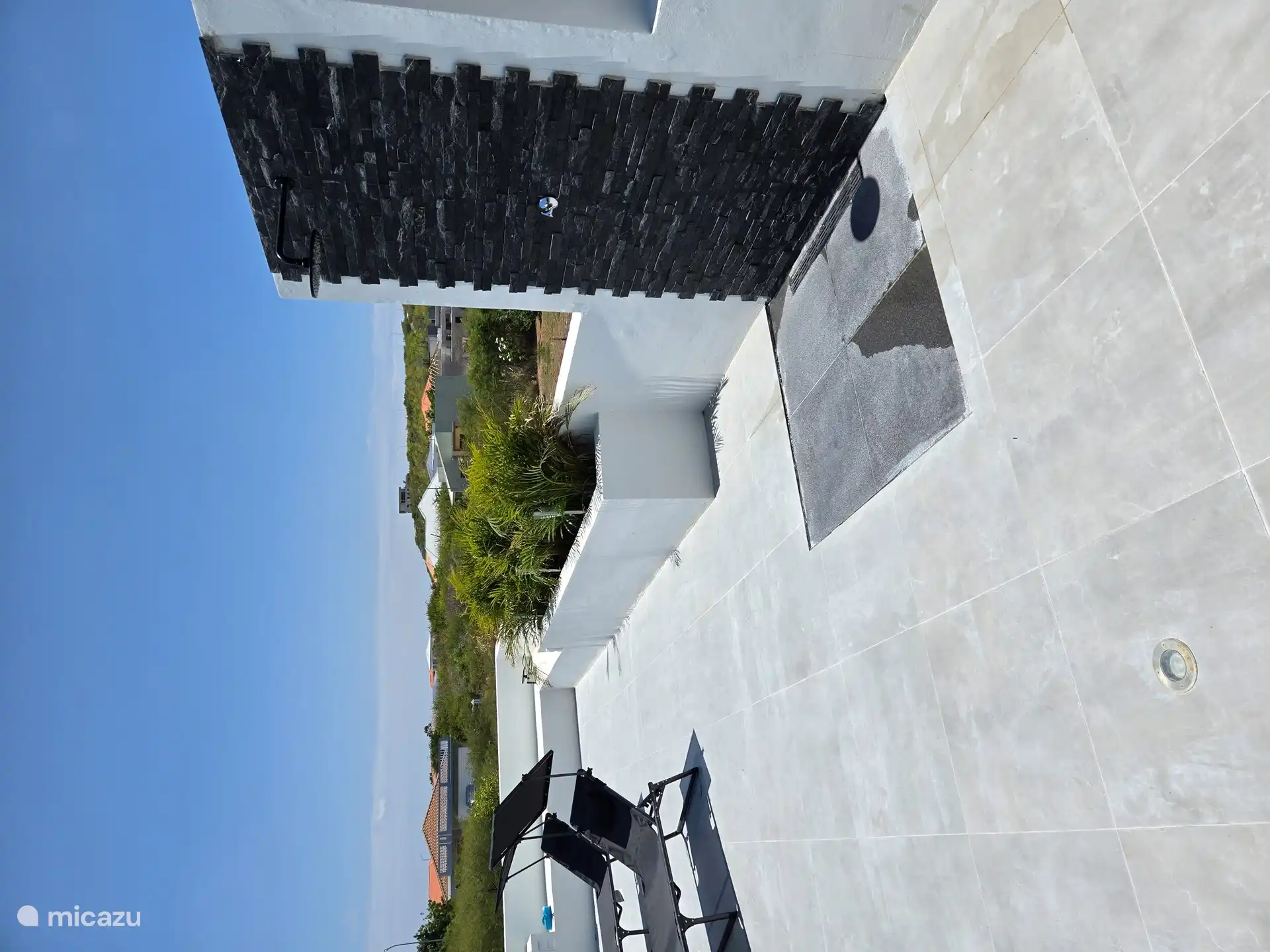  Rinse off outside under this nice outdoor shower 