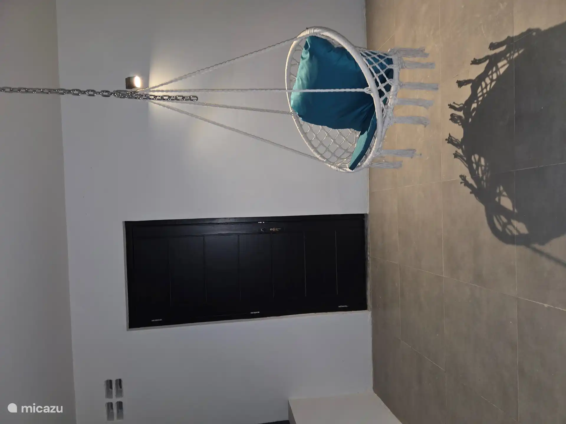 Rocking chair/ hammock chair on terrace