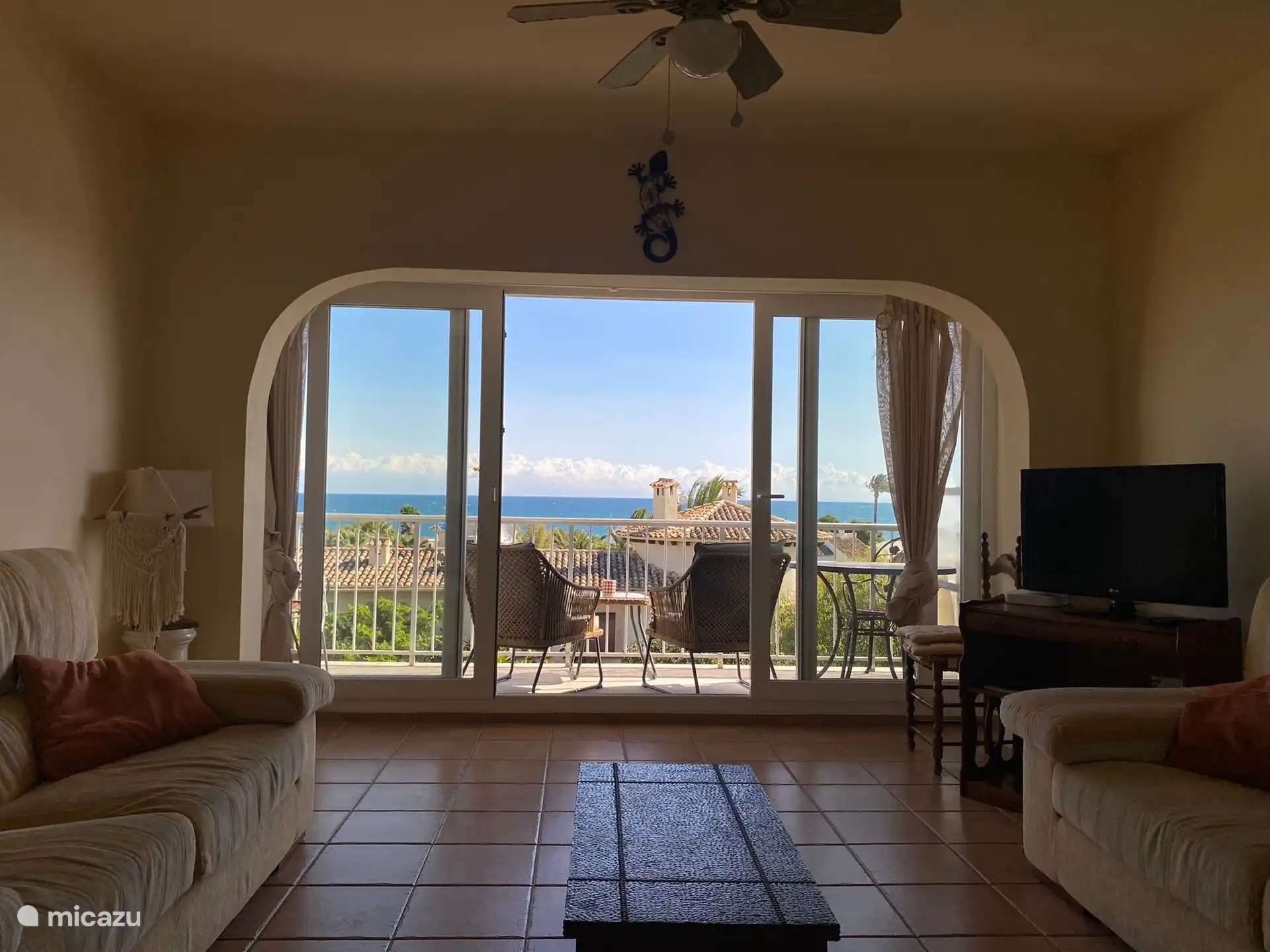 The living room space is cozy and ample.