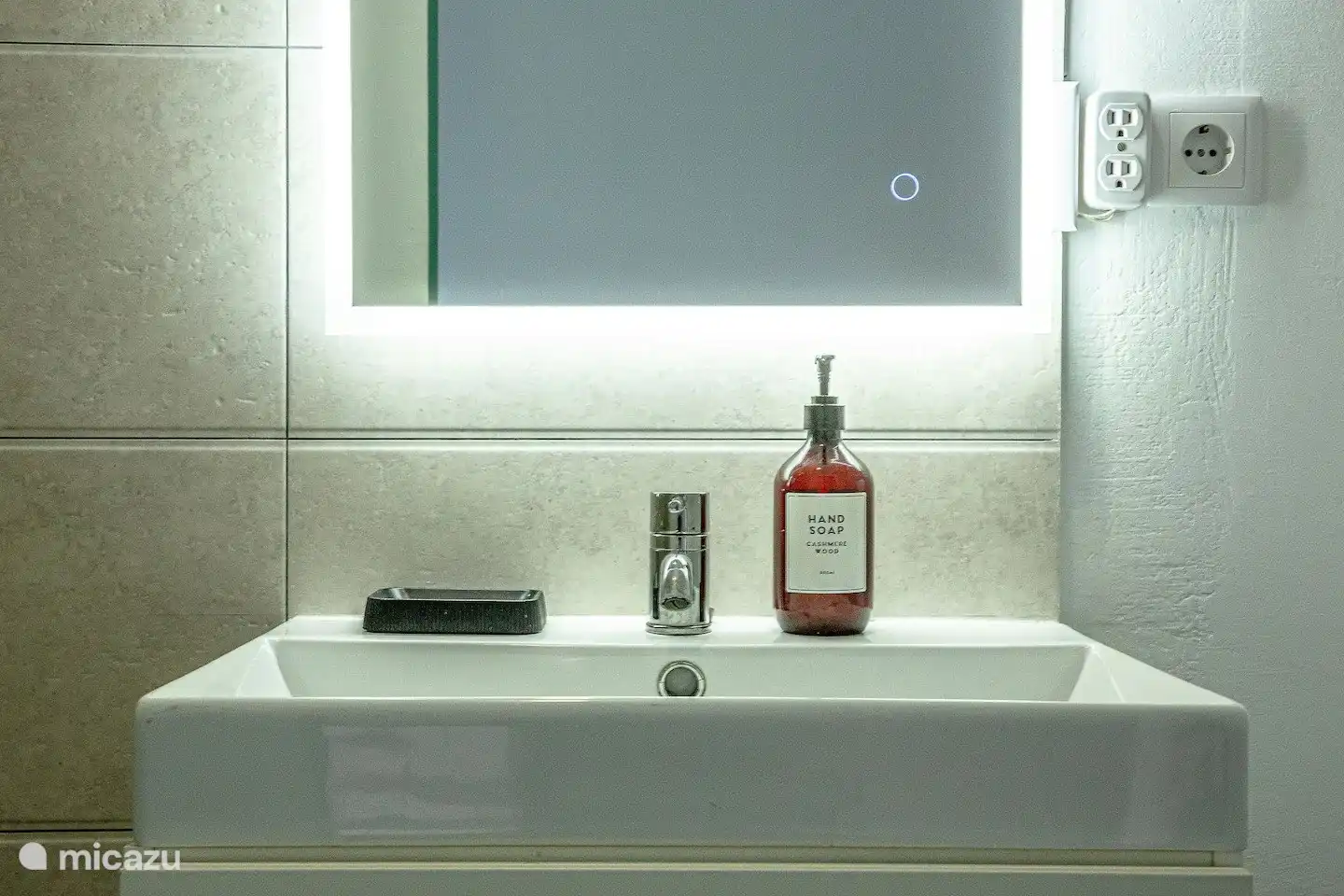 Bedroom 3 has its own en suite bathroom, including shower, sink and toilet.