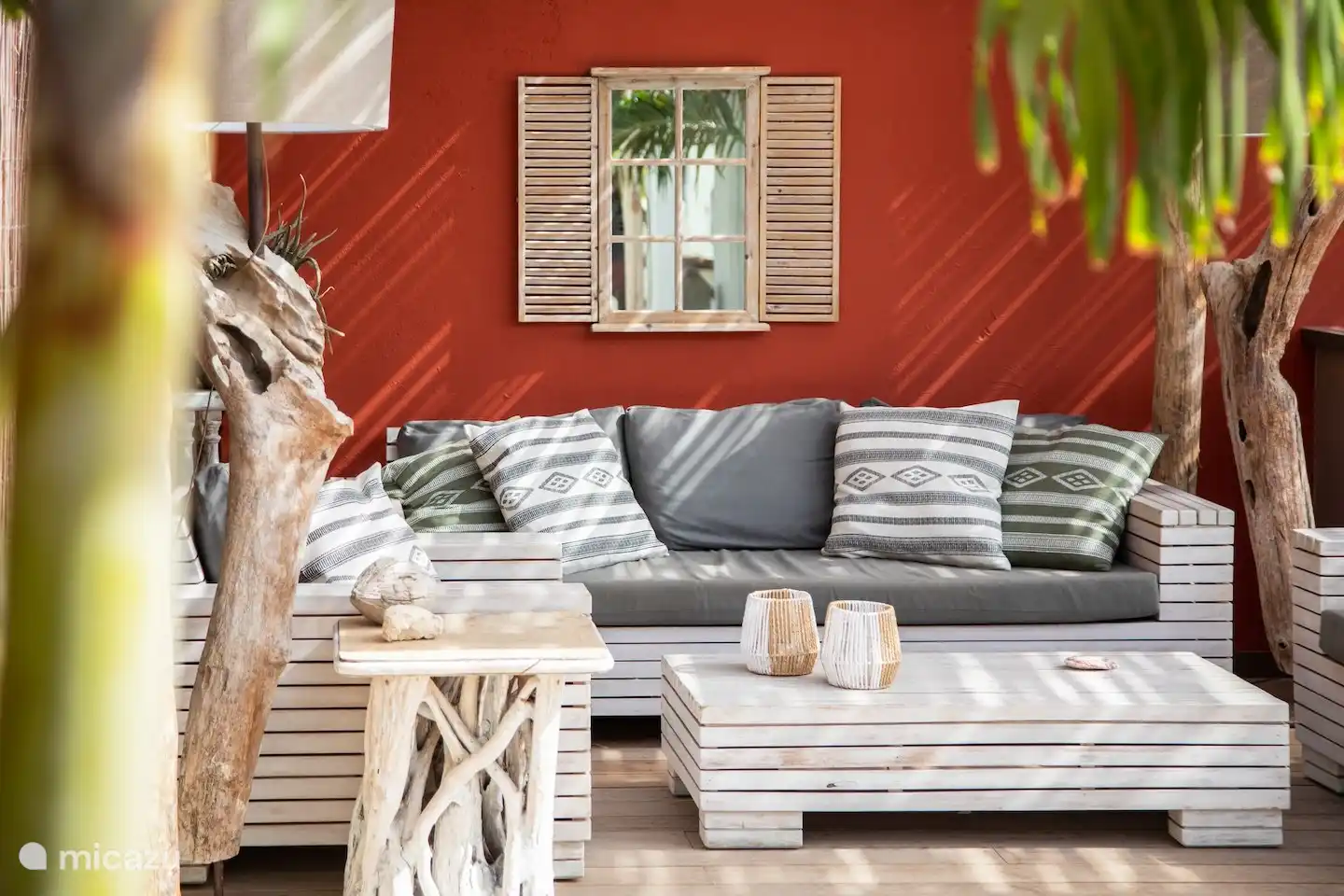 Seating area in the garden by the pool