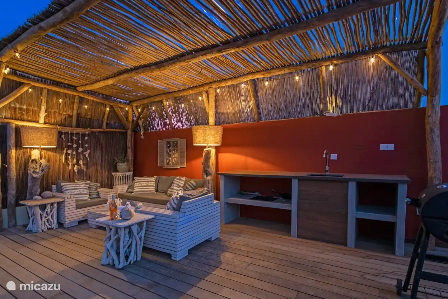 Seating area in the garden by the pool