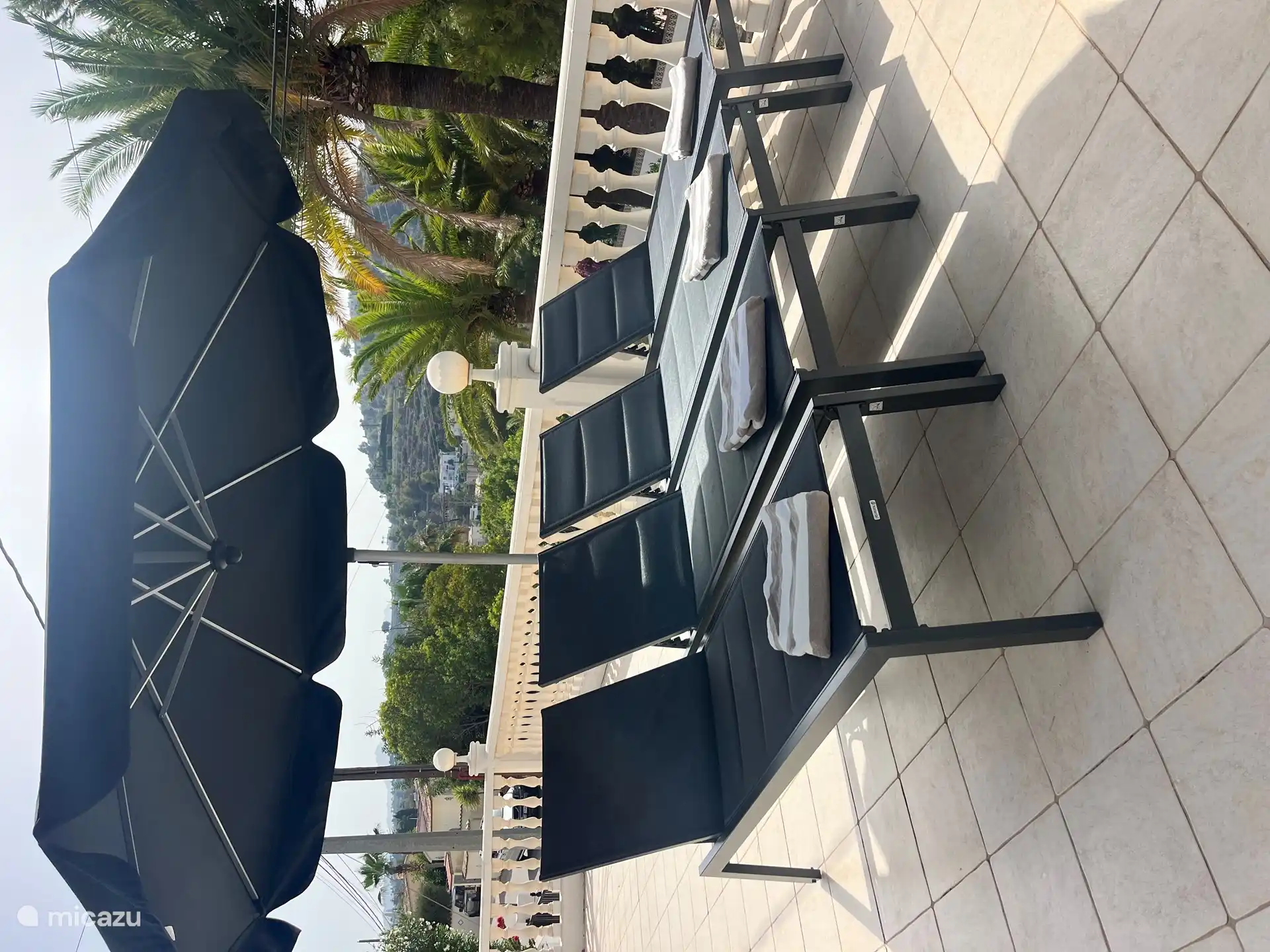 sunbeds by the pool, towels are already waiting for you