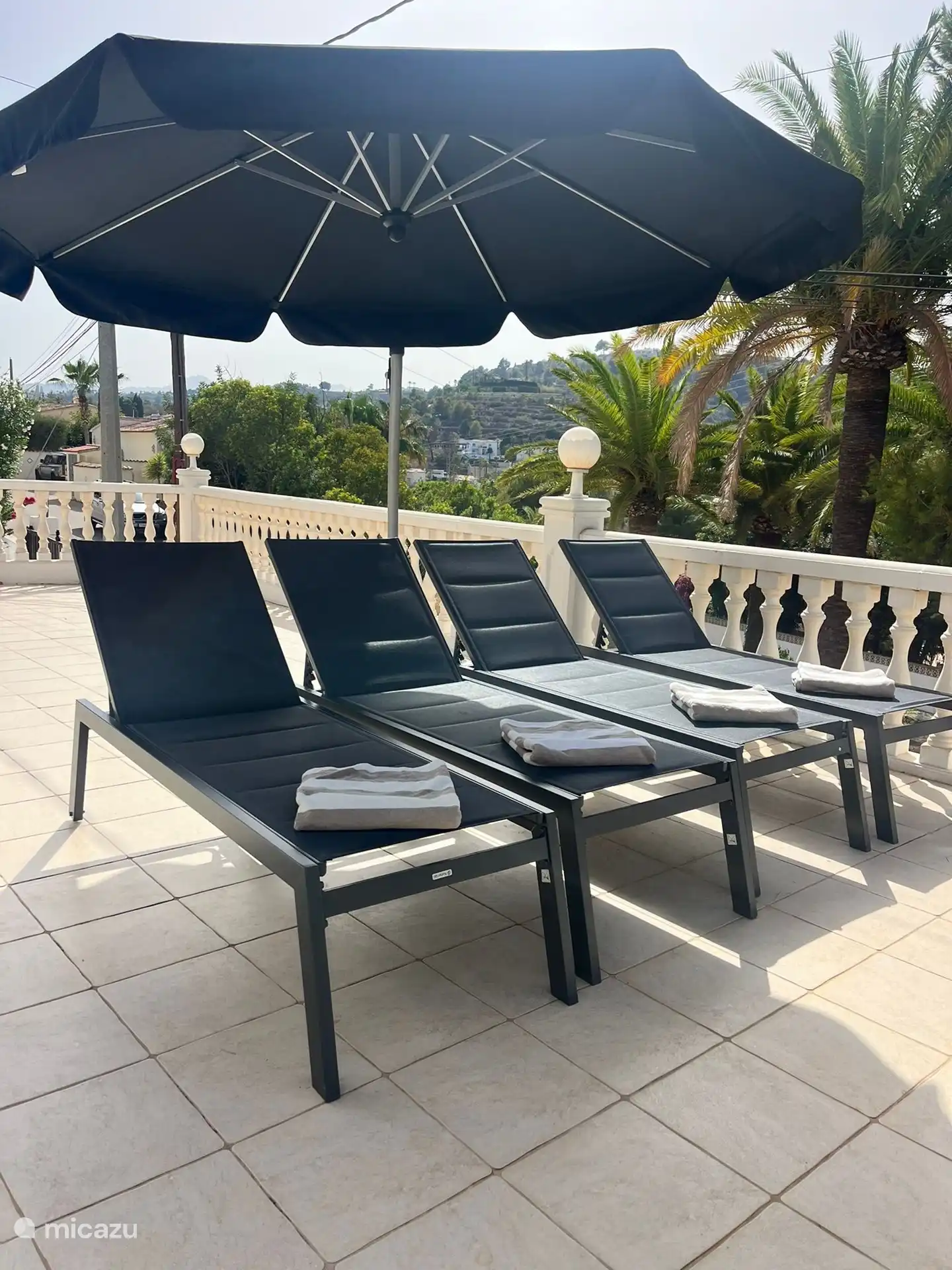 The sunbeds by the pool