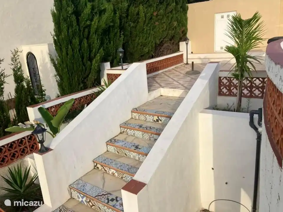stairs next to the pool